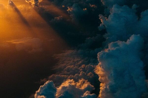 Pacific low cloud feedback: Dark layered storm clouds stretching across a wide sky